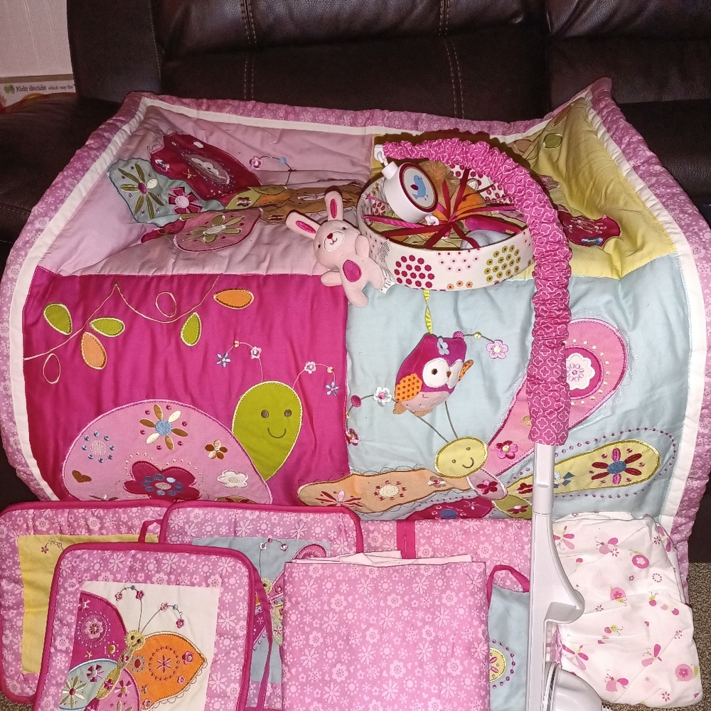 Gently used baby girl crib set 8 pieces